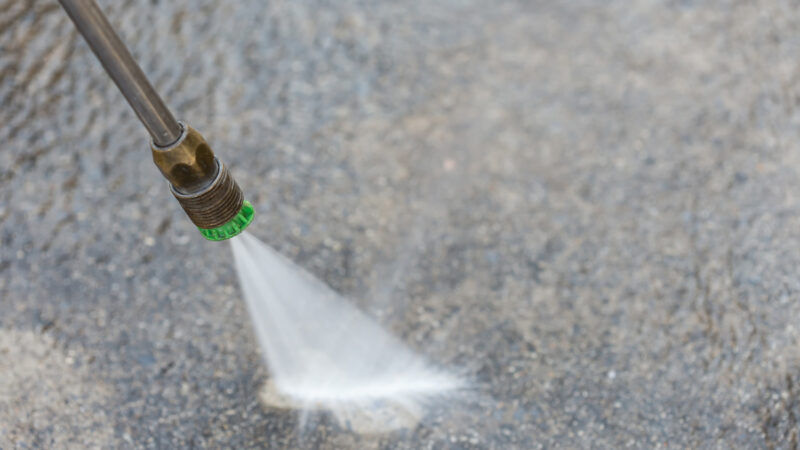 close-up-outdoor-floor-cleaning-with-high-pressure-water-jet